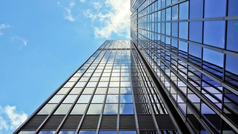 professional window cleaning on modern skyscraper