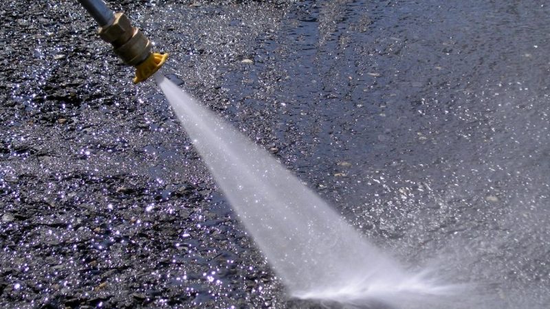 professional window washers cleaning tall building